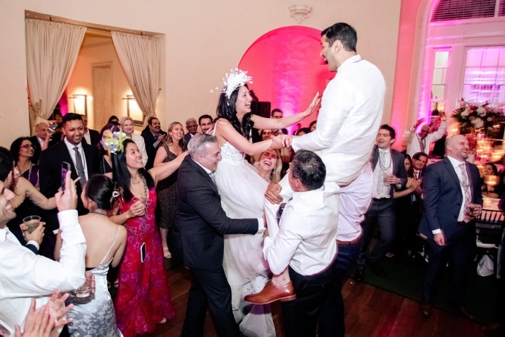 Guests enjoying a lively wedding celebration in New Orleans, captured by Matthew Foster Photography.