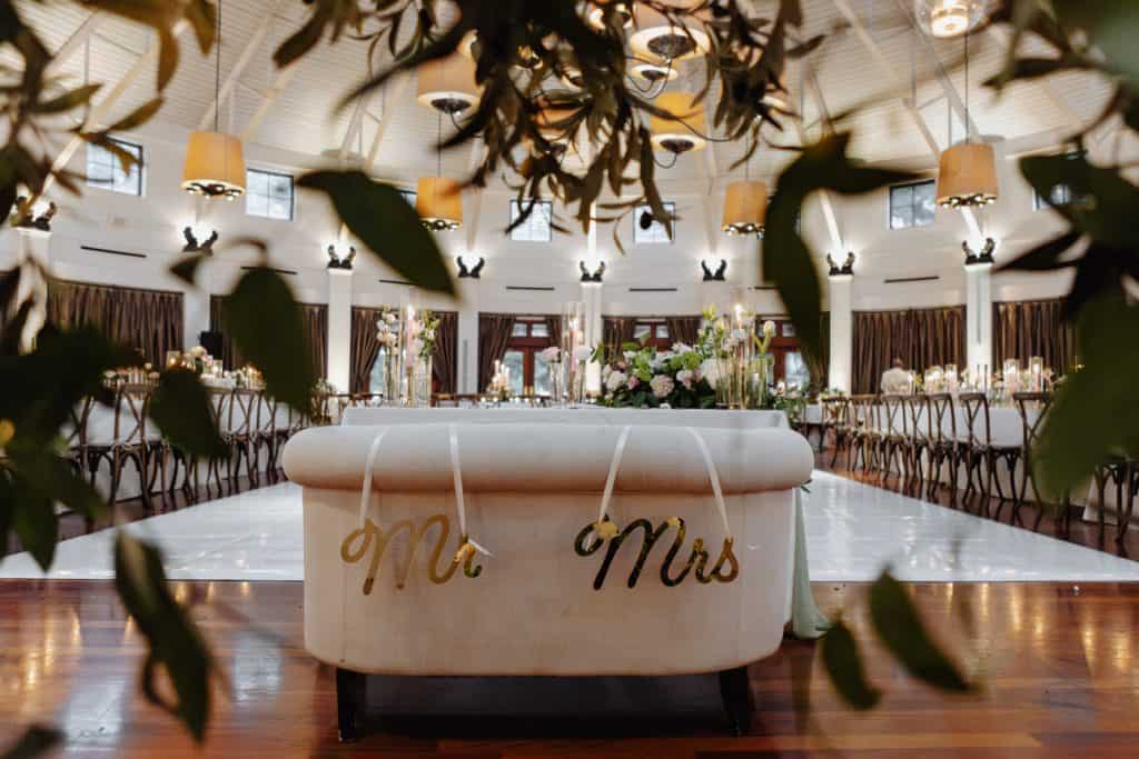 Beautiful wedding decor for a New Orleans ceremony, featuring romantic lighting, flowers, and elegant table settings.