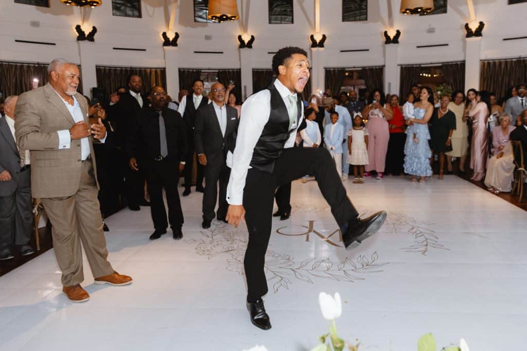 Vibrant wedding dance scene in New Orleans captured by a professional wedding photographer.