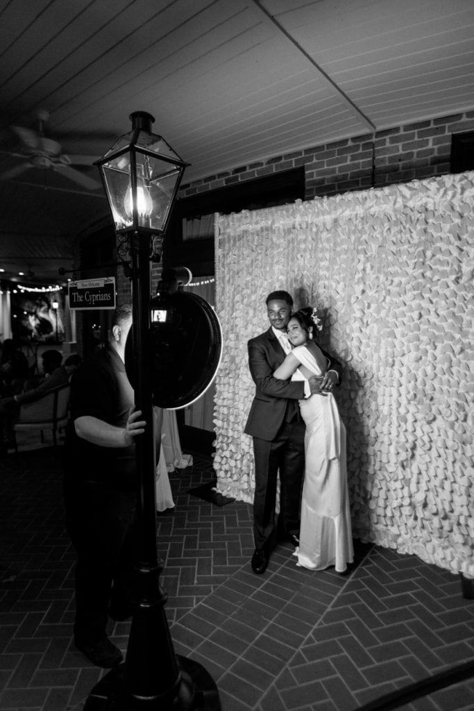 Romantic wedding moment captured at a New Orleans venue.