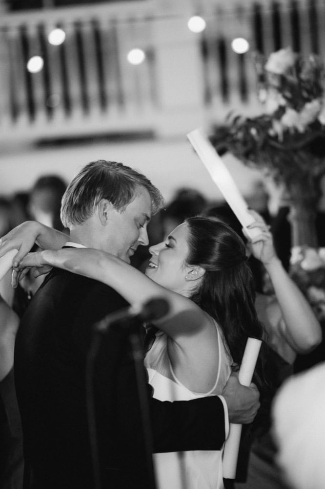 Romantic couple dancing at wedding reception in New Orleans.
