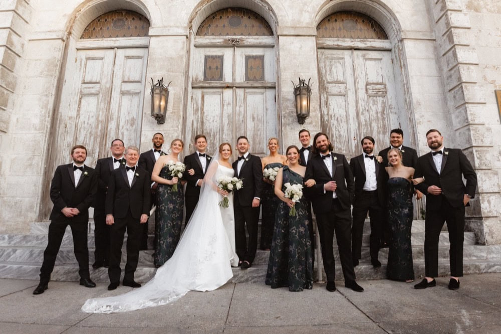 Wedding party on the steps of thethe Marigny Opera House in New Orleans.