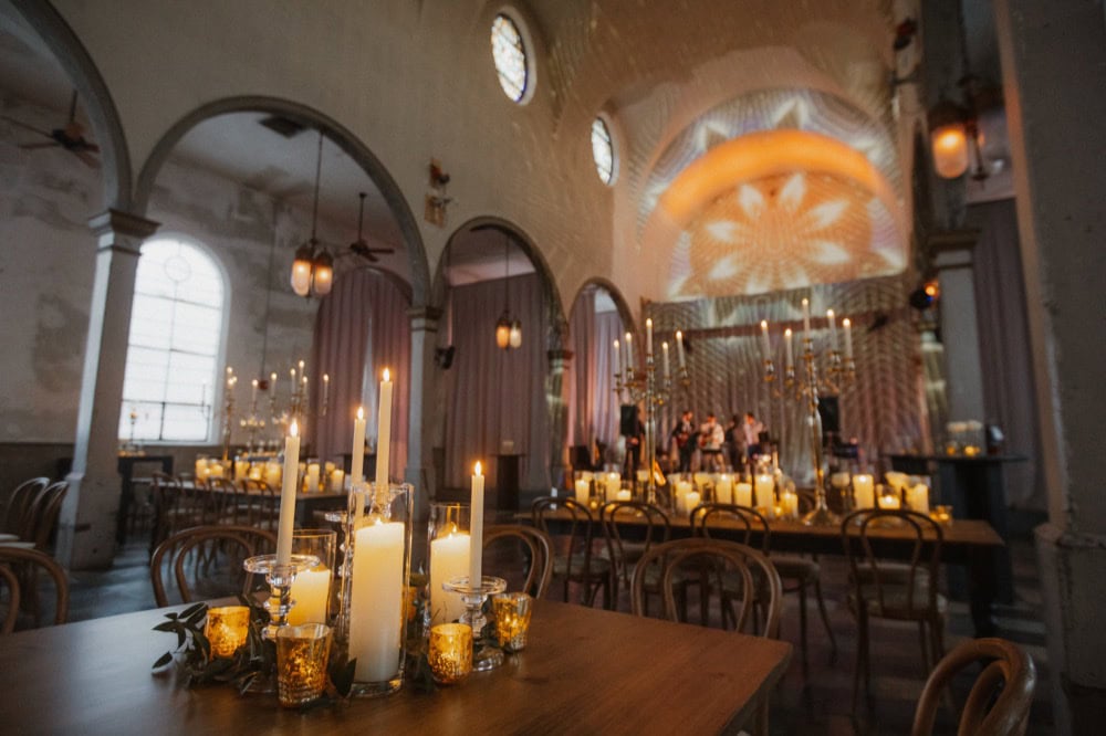 Elegant New Orleans wedding reception venue with candlelit decor.