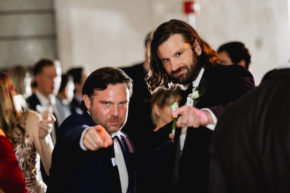 Wedding celebration in New Orleans with stylishly dressed guests.