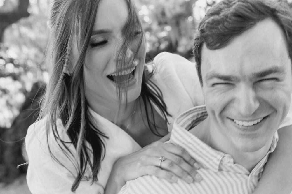 Happy couple at an engagement captured by Matthew Foster in New Orleans.