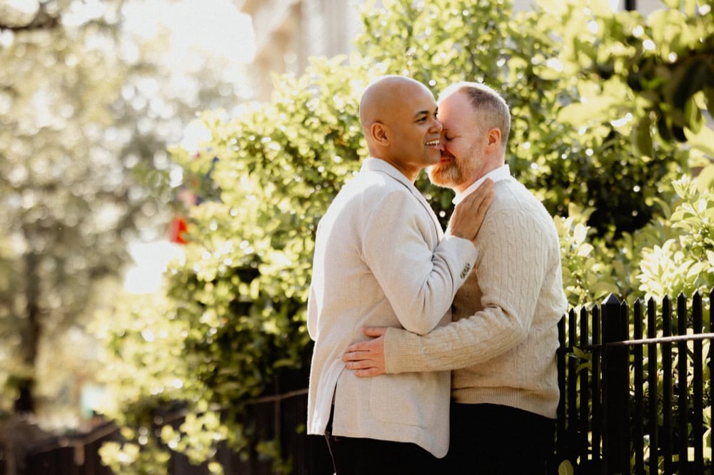 Couple sharing a romantic moment outdoors in New Orleans.
