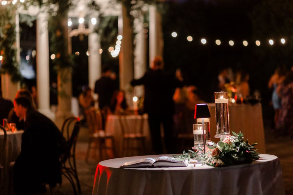 Elegant wedding reception in New Orleans with romantic lighting and floral decor.