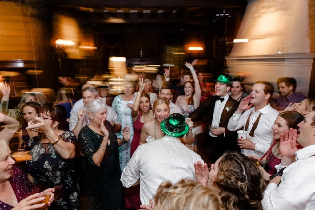 Wedding guests celebrating at a New Orleans wedding reception.