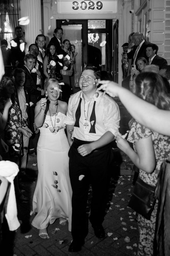 Joyful wedding celebration with dancing and guests in New Orleans.