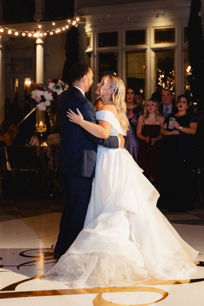 Bride and groom dancing at wedding reception in New Orleans.