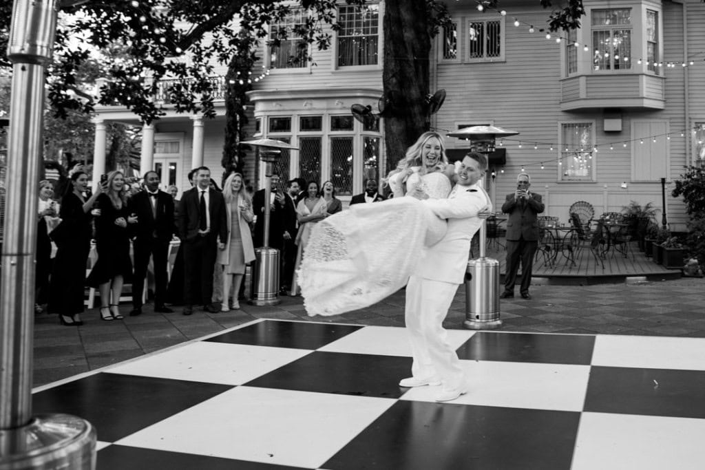Bride and groom dancing at wedding reception in New Orleans.