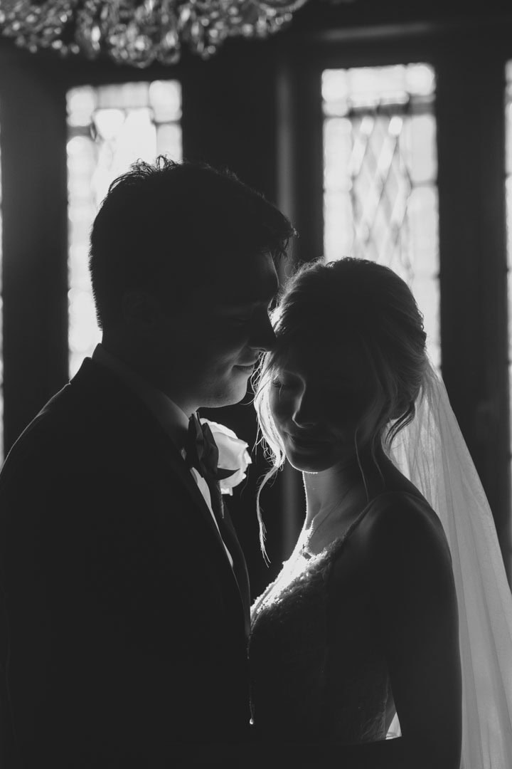 Silhouette of bride and groom in New Orleans wedding setting.