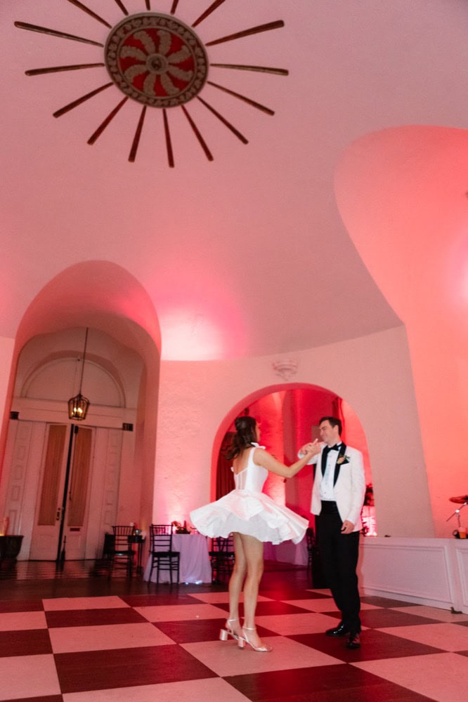 Bride and groom dancing at New Orleans wedding reception.
