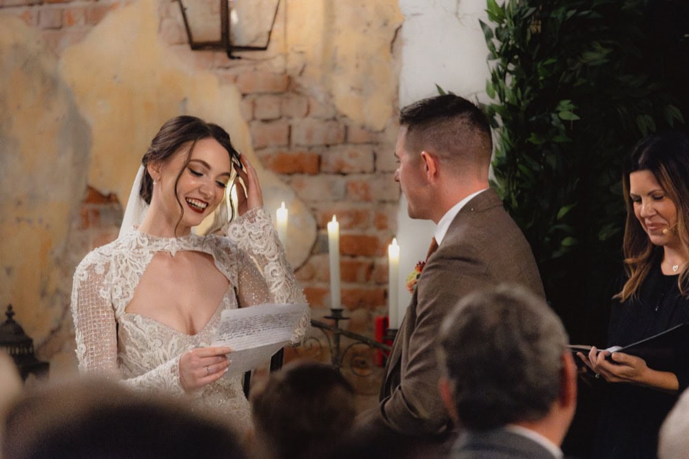 Bride and groom exchanging vows at a New Orleans wedding ceremony.