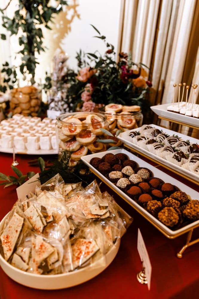 Elegant wedding dessert table with assorted sweets and chocolates in New Orleans.