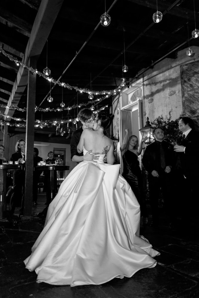 Bride and groom dancing at New Orleans wedding reception.