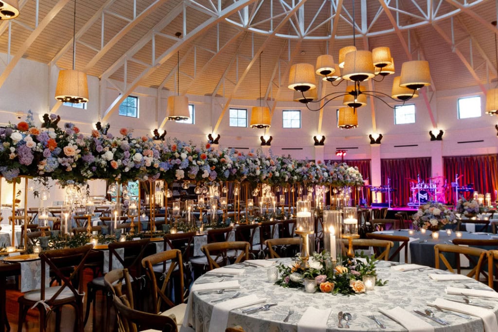 Beautiful wedding reception setup with floral arrangements and elegant lighting in New Orleans.