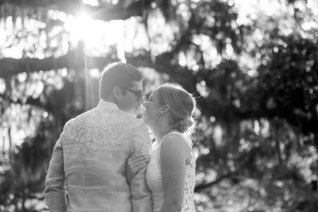 Couple kissing outdoors during wedding in New Orleans by Matthew Foster.